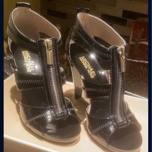 Michael Kors black heels. Never worn. Size 6